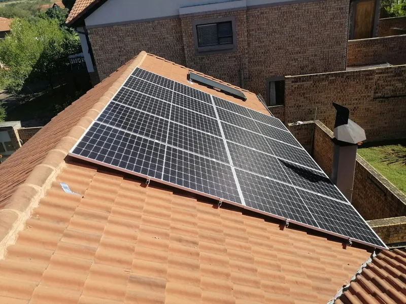 Solar panels mounted on a tiled residential roof in Escondido